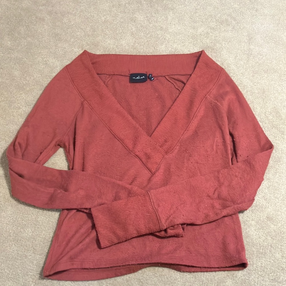 Orange deep v neck sweater from Urban Outfitters